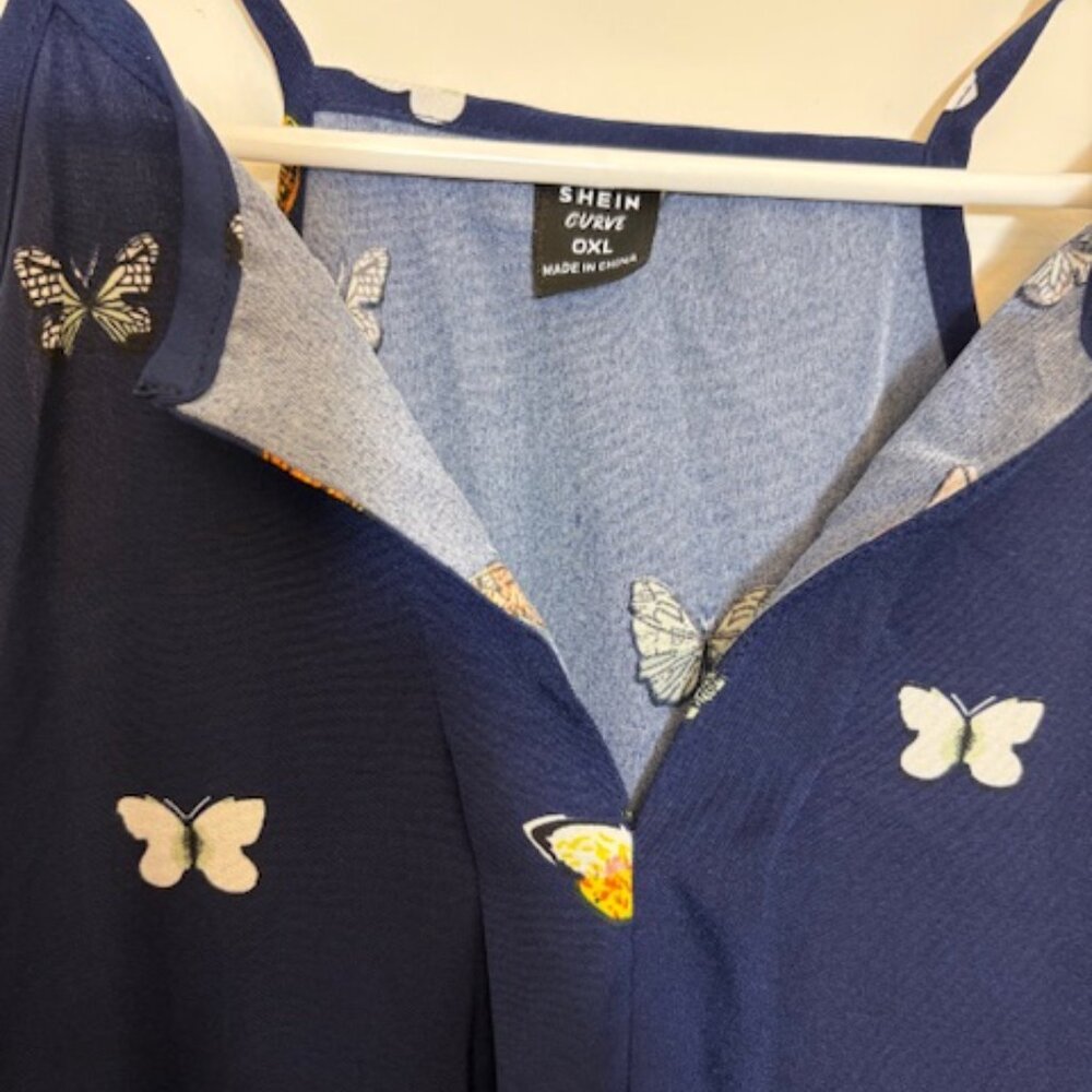 Navy Blue Butterfly Print Sleeveless Blouse - Picture 2 of 3